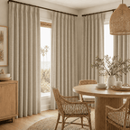 Light beige cotton-linen curtain panels with pleated top and ring-hung rod pocket