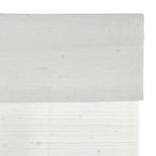Light ivory bamboo woven shade with subtle speckles and fine horizontal weave lines.