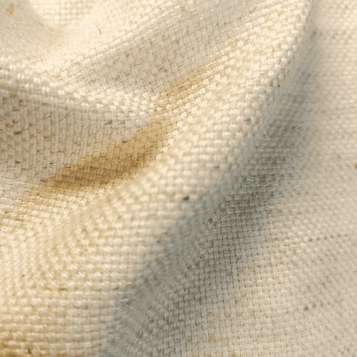 Beige bamboo-linen fabric close-up with tight woven texture and subtle speckle