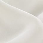 Cream sheer curtain weave close-up with smooth, semi-translucent fabric texture