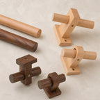 Solid wood curtain rod parts in light beech and dark walnut tones