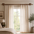 Walnut solid wood curtain rod with circular rings and wall-mounted end brackets